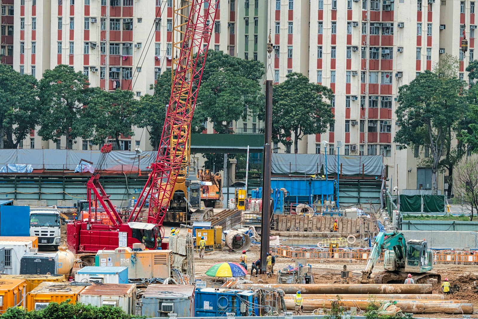 Real construction site with crane and active machinery